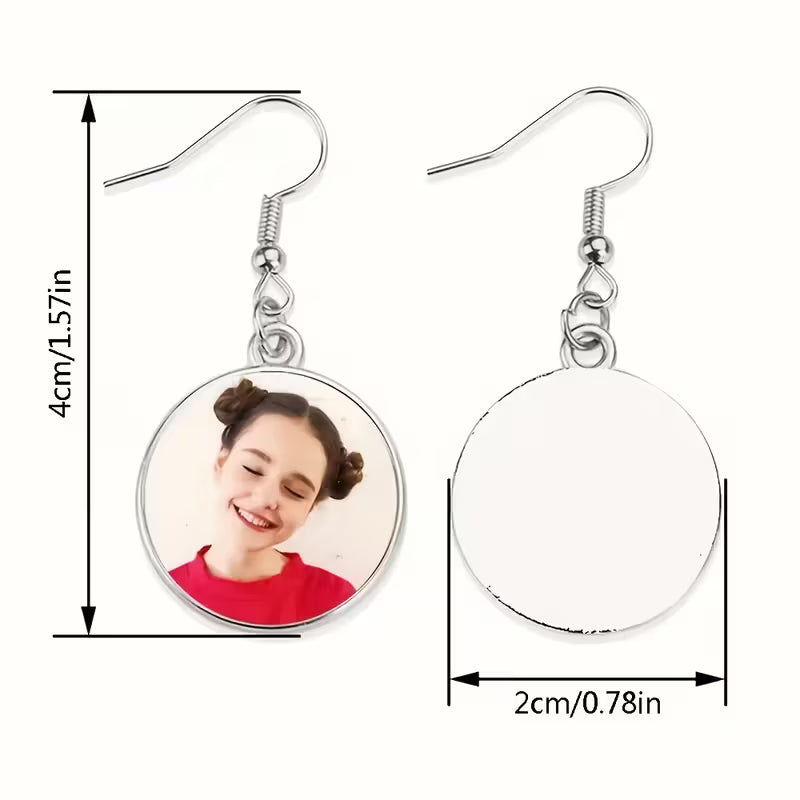 photo hanging earrings with a glass dome pendant