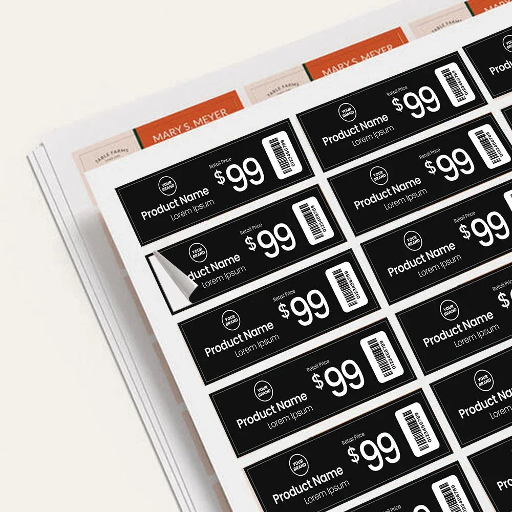 Sheet of black custom product price labels with white text and barcodes.